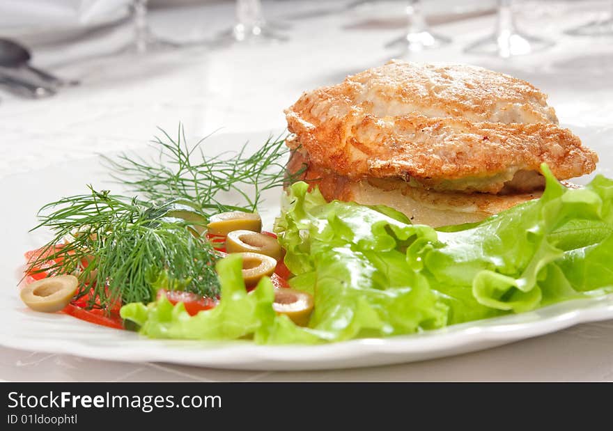 Tasty vegetable salad with backed meat on plate copy