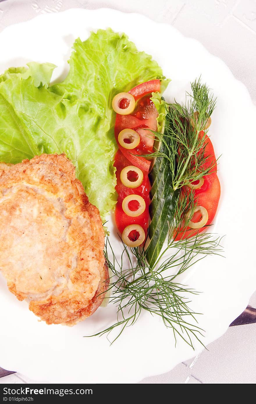 Meat With Salad And Olives