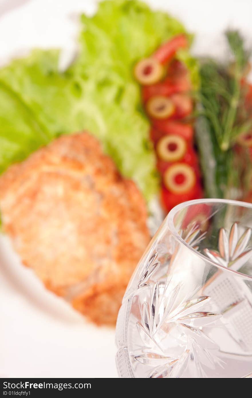 Goblet with backed meat and green salad