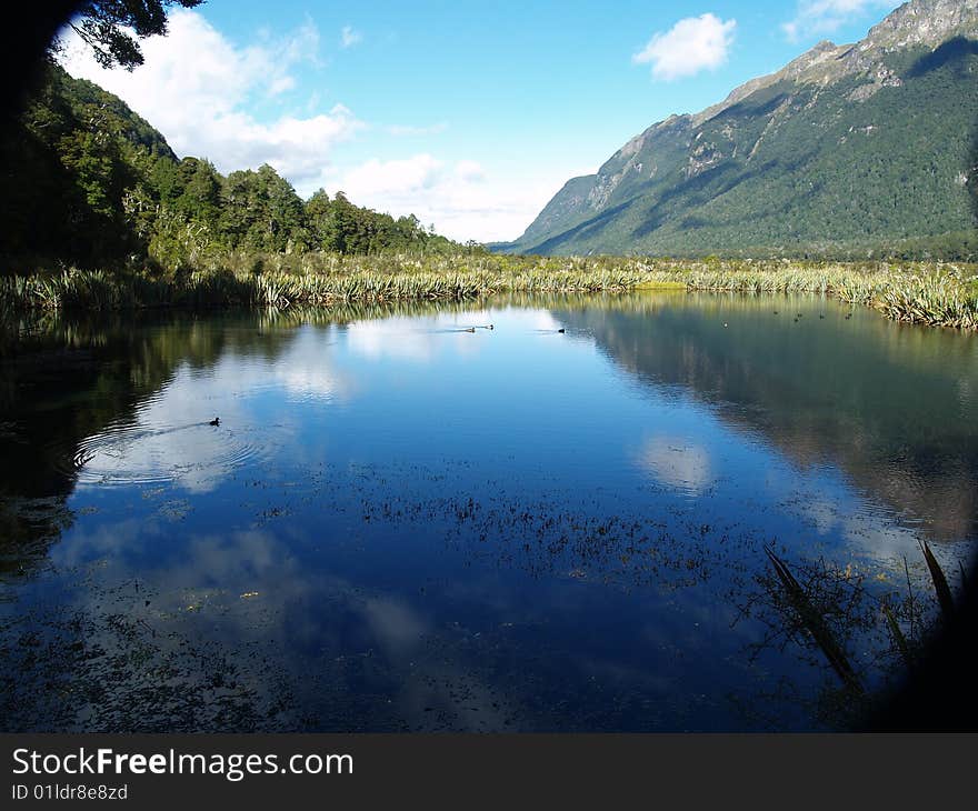 Lake view of Mountains in New Zealand called the reflective lake. Lake view of Mountains in New Zealand called the reflective lake