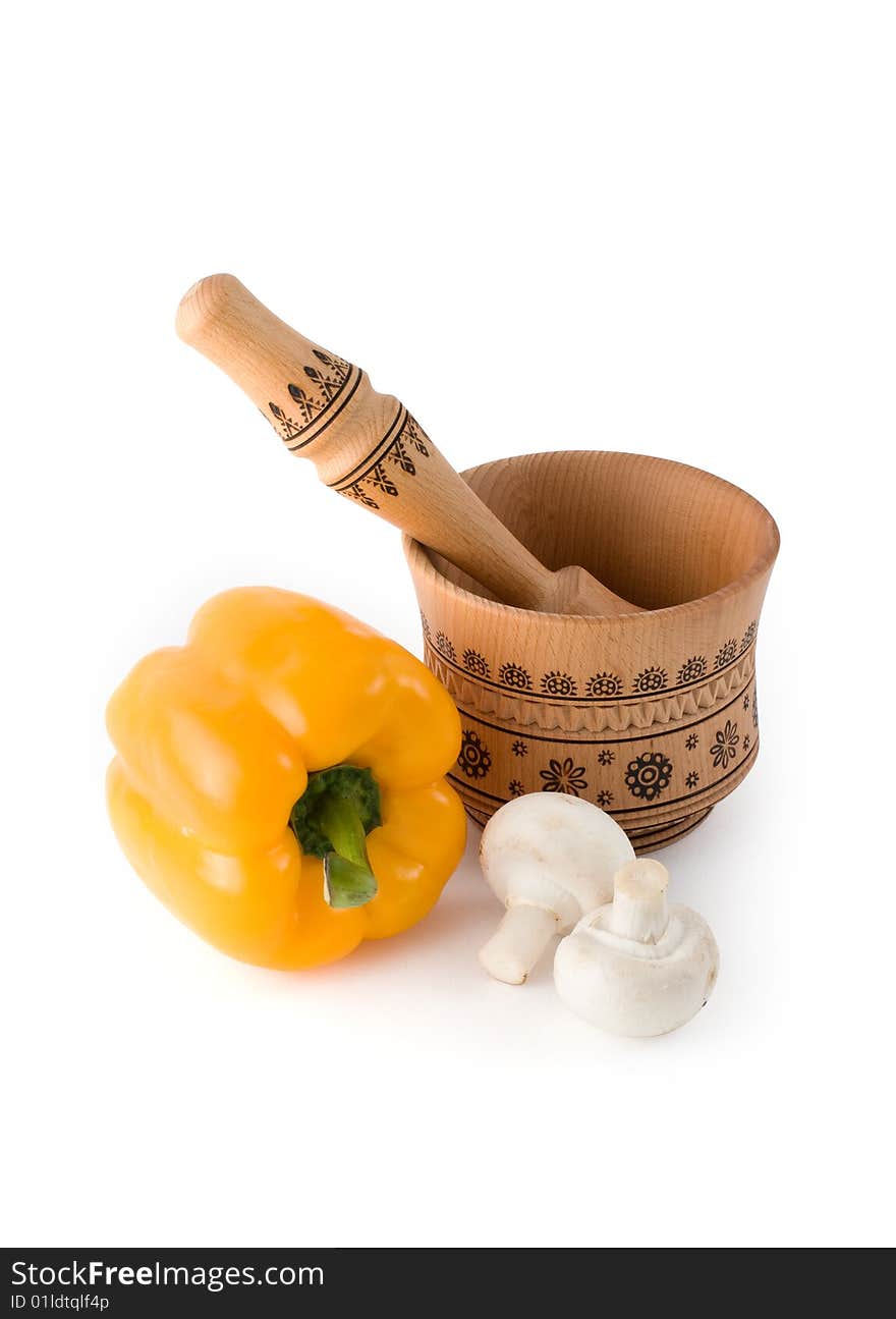 Vegetables and mortar on a white background