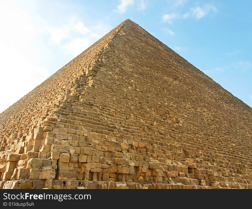 The Great Pyramid of Giza (or Khufu's Pyramid, or Pyramid of Cheops). The Northern side. Location: El-Giza plateau. Cairo, Egypt. The Great Pyramid of Giza (or Khufu's Pyramid, or Pyramid of Cheops). The Northern side. Location: El-Giza plateau. Cairo, Egypt.