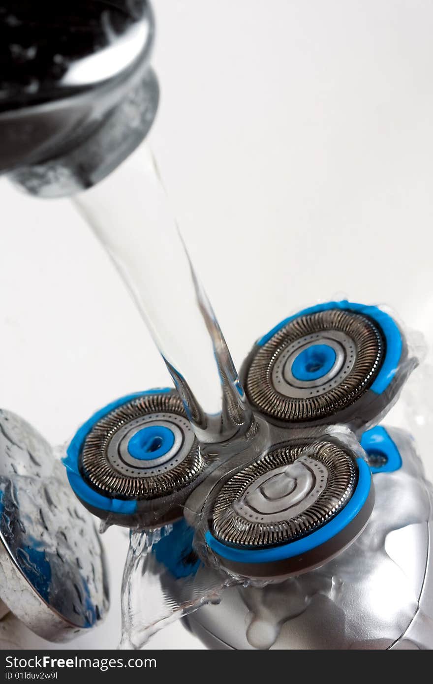 Macro of Shaver Head under Tap