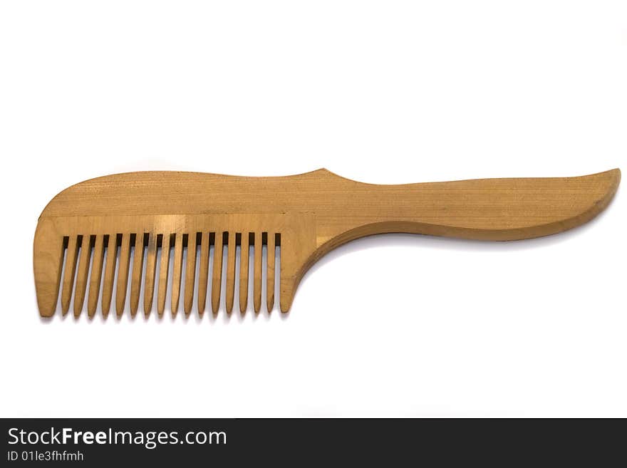 Wood comb on white background