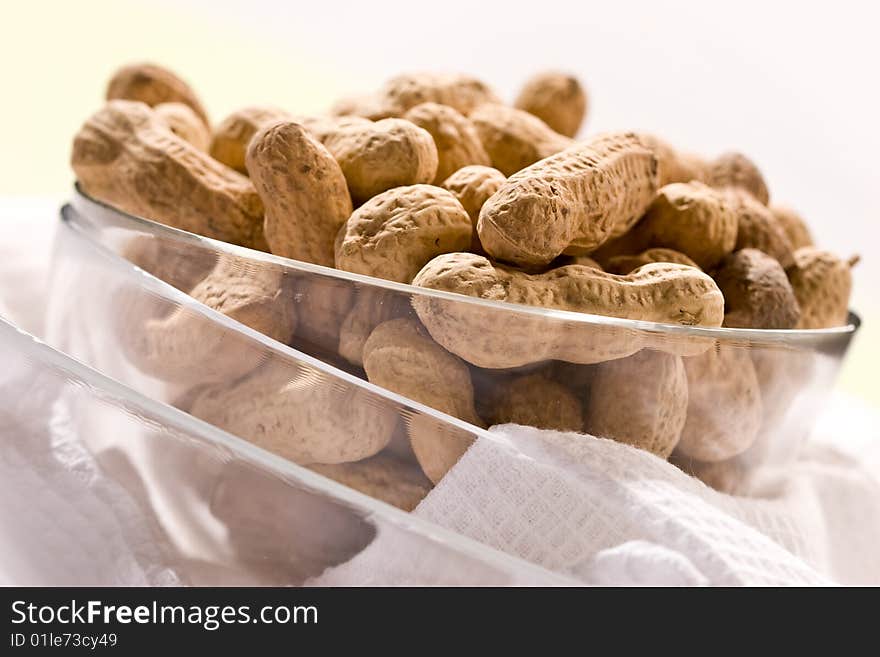 Foodstuff theme:  peanut on the glassy bowl