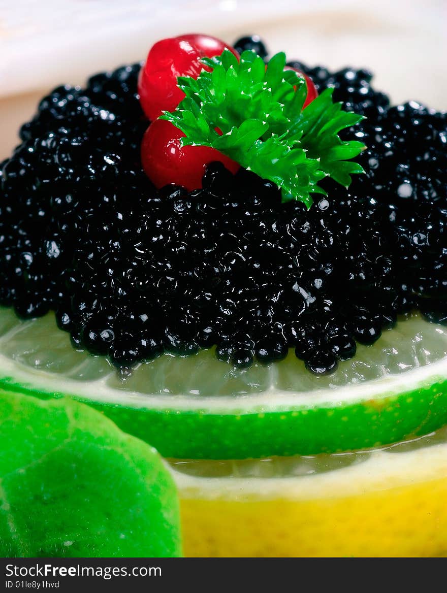 Coctail decoration consisting of blueberry and lemons. Coctail decoration consisting of blueberry and lemons