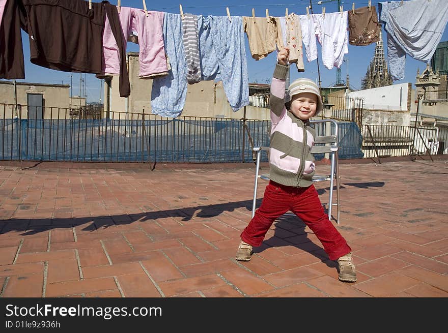 Portrait of a sweet girl with the clothesline