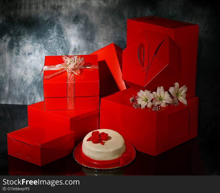 Red luxury boxes on dark background. Red luxury boxes on dark background