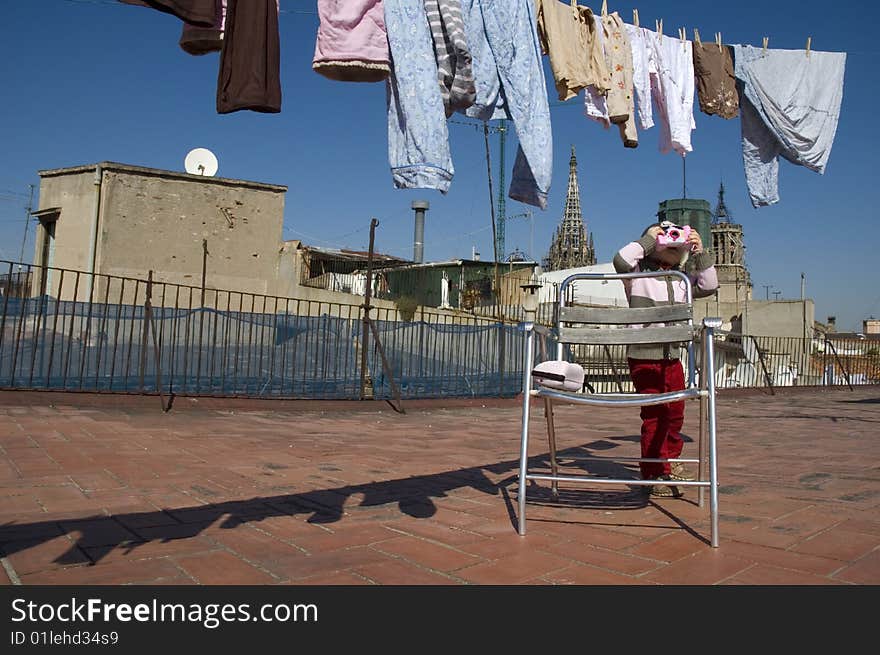 Sweet girl with pink digital camera and clothesline. Sweet girl with pink digital camera and clothesline