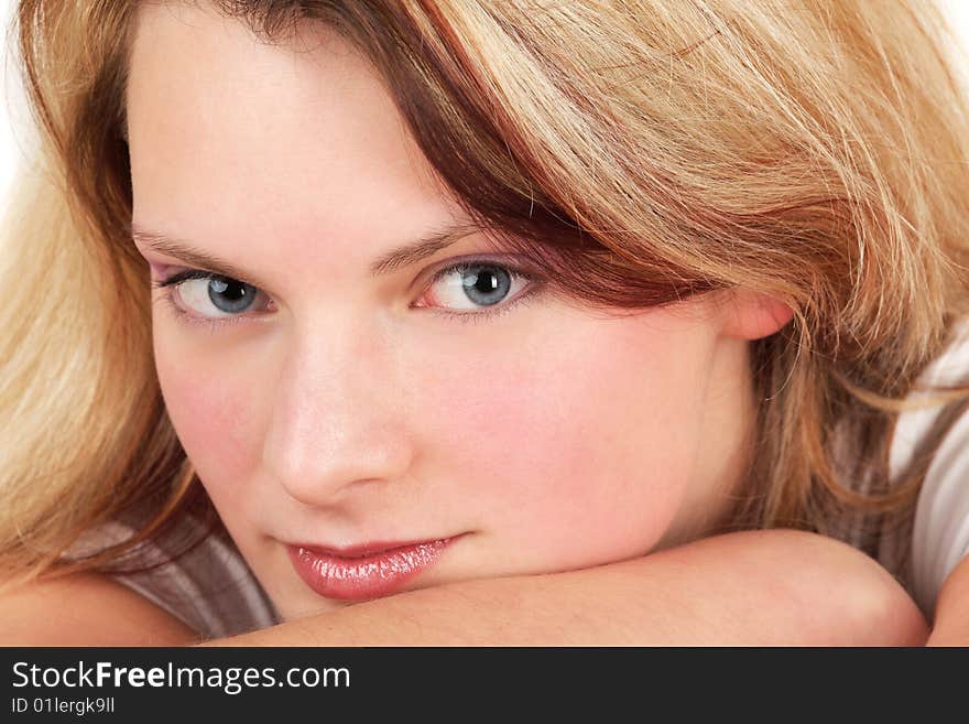 Close-up portrait of young blonde woman, studio shot. Close-up portrait of young blonde woman, studio shot