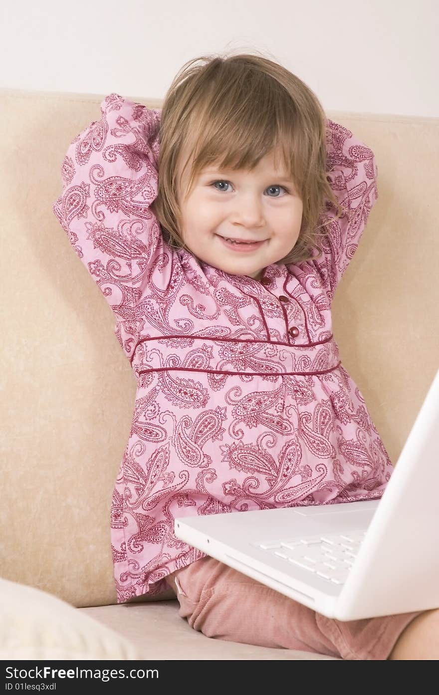 Young girl using a laptop. computer generation