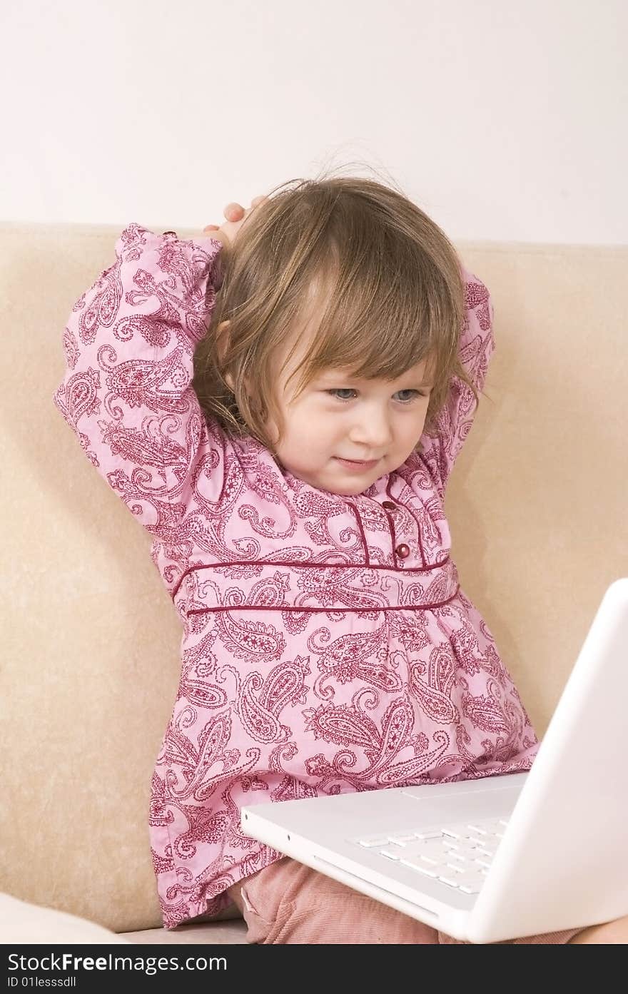 Young girl using a laptop