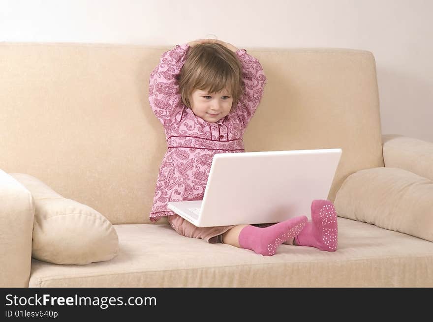 Young girl using a laptop