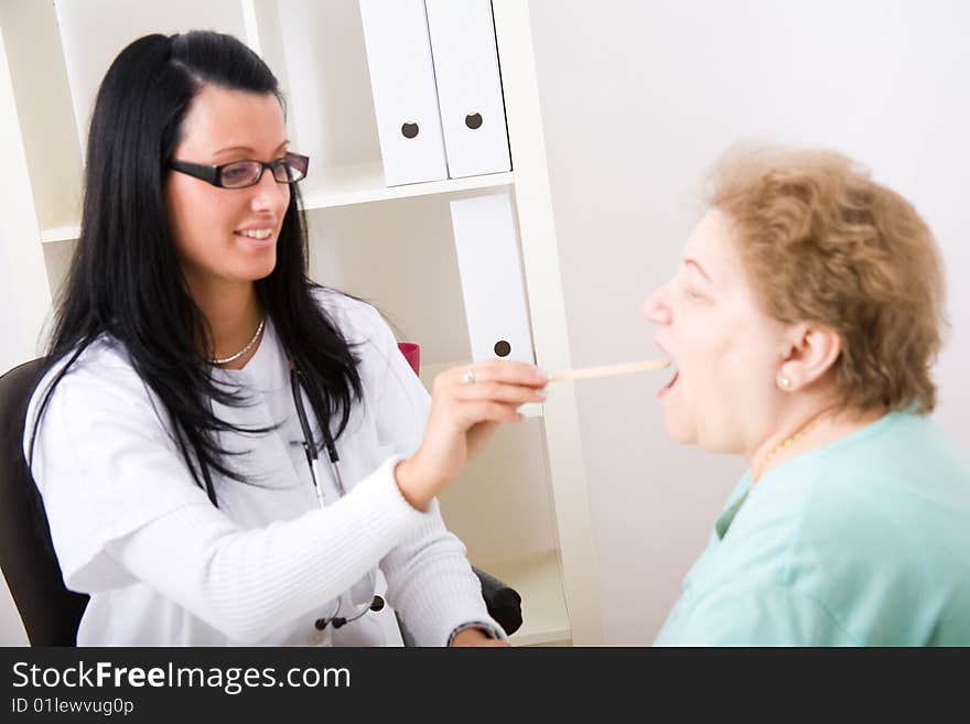 Young Doctor Inspect A Patient