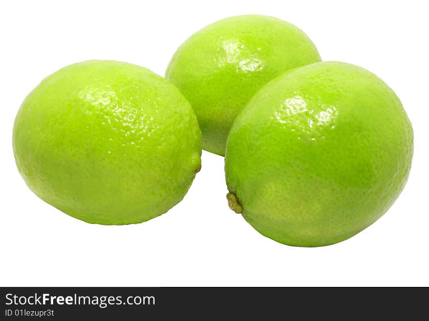 Fresh green limes isolated over white with clipping path