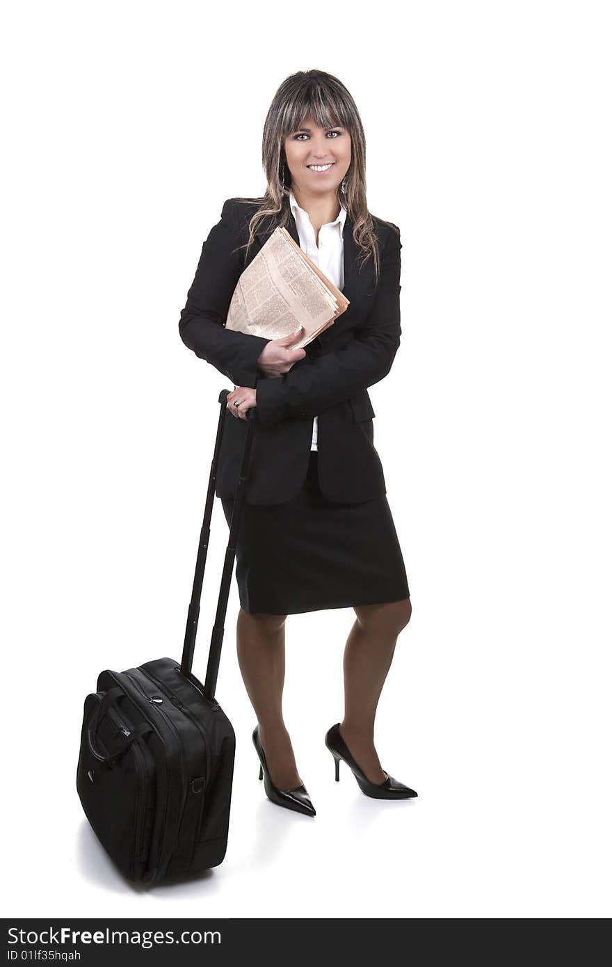 Beautiful young businesswoman holding newspaper