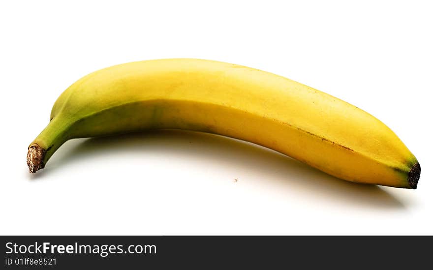 The ripe banana isolated on a white background. Light shade.