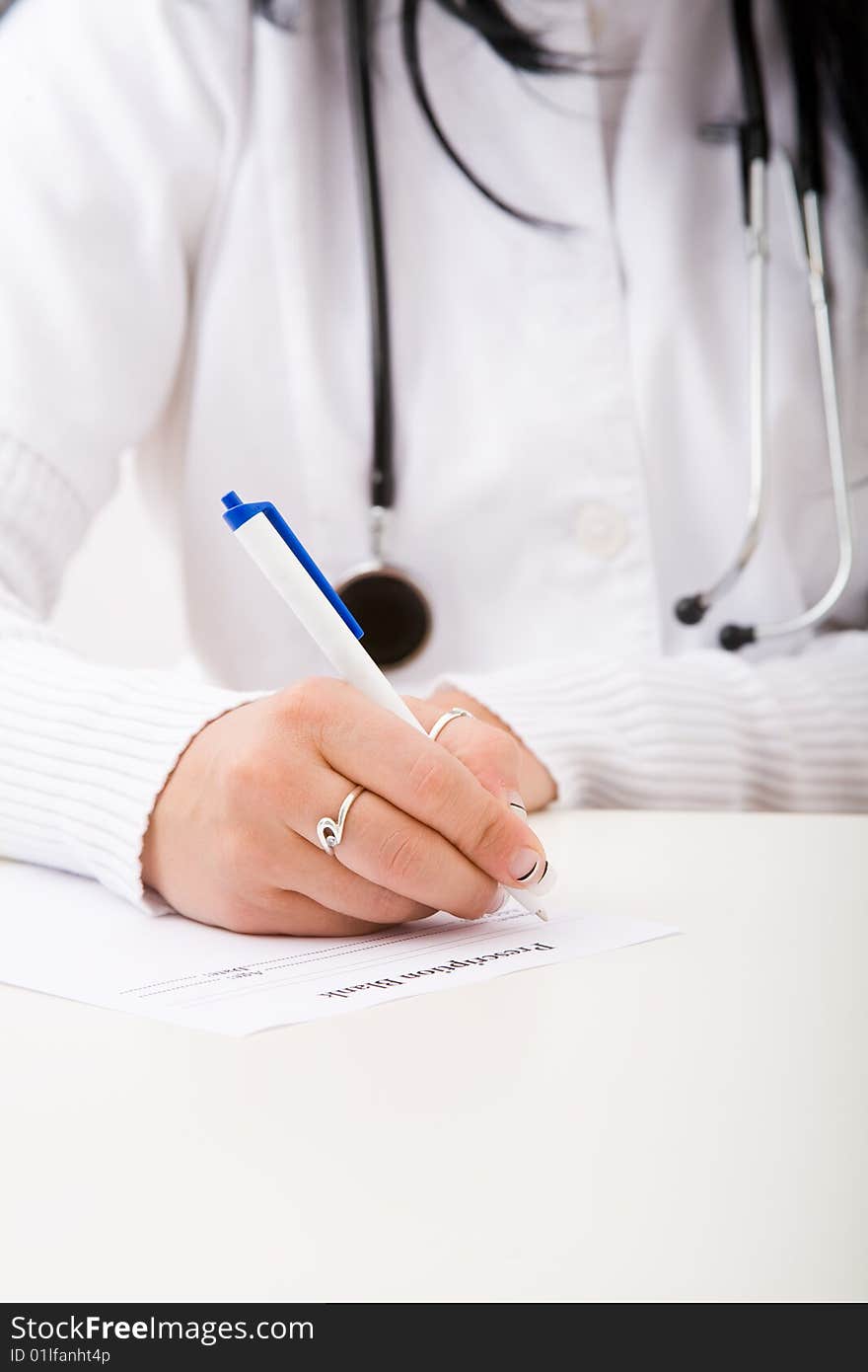 Beautiful young doctor in doctor's office