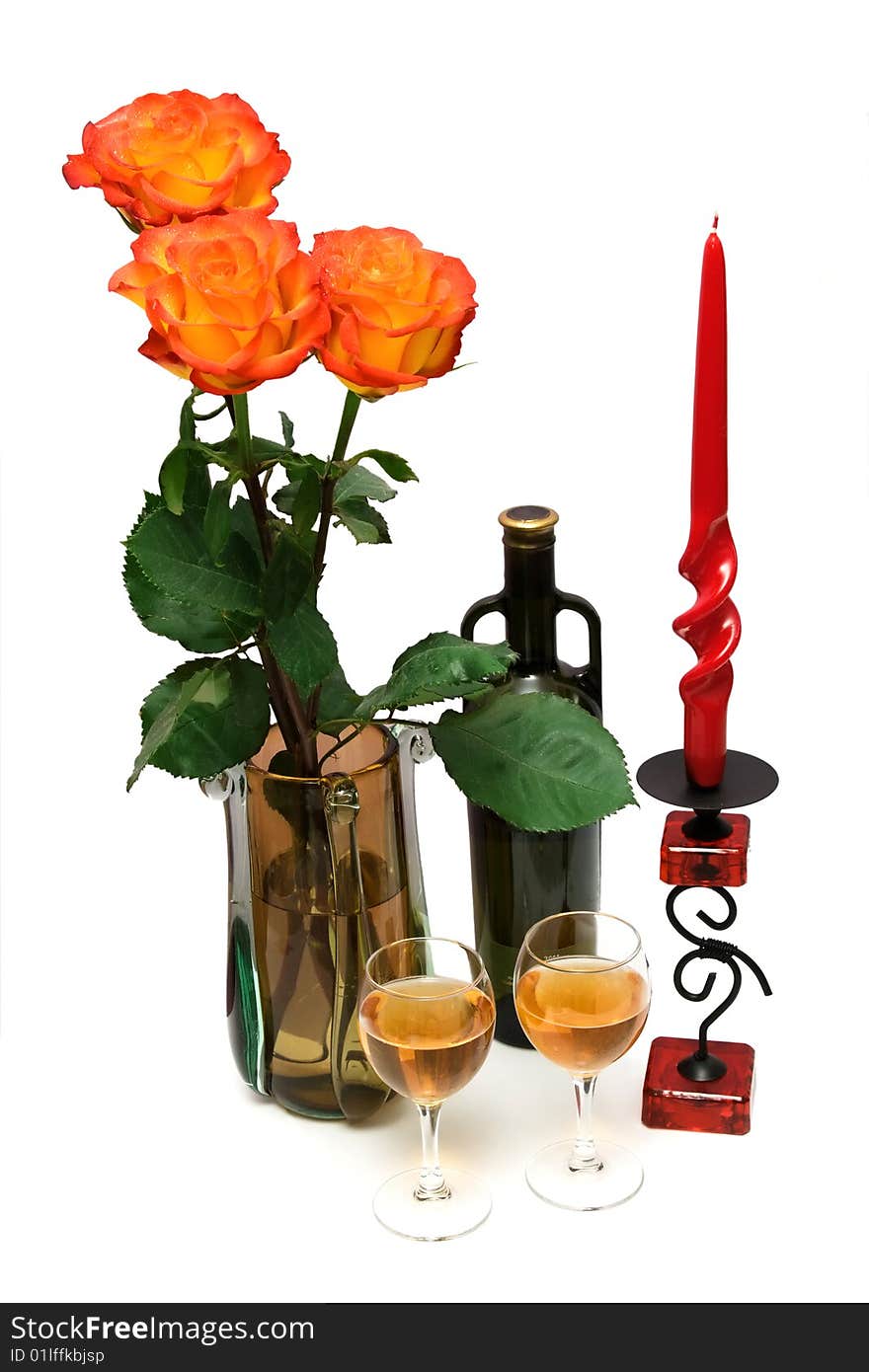 Bottle of wine, glasses, red candle and bouquet of orange roses isolated on wite. Bottle of wine, glasses, red candle and bouquet of orange roses isolated on wite