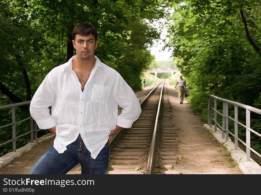 Handsome man on the railway