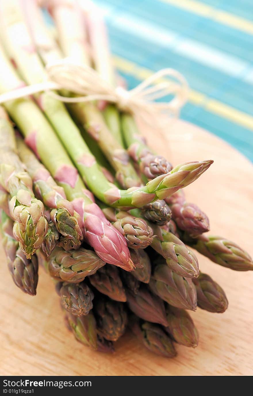 Fresly asparagus on wood table