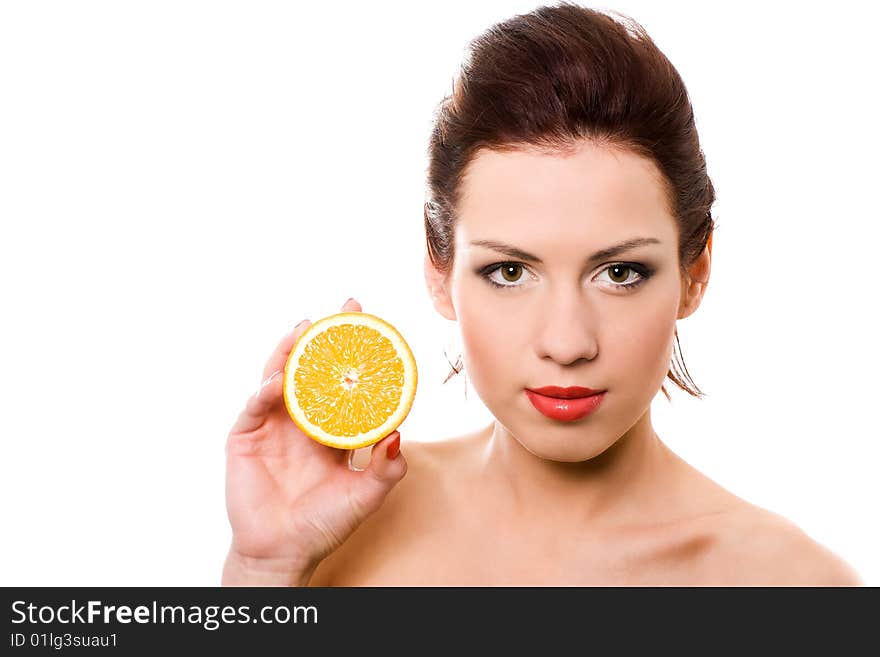 Closeup portrait of girl with half of orange over white. Closeup portrait of girl with half of orange over white