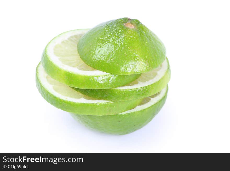 Fresh green lime isolated on white