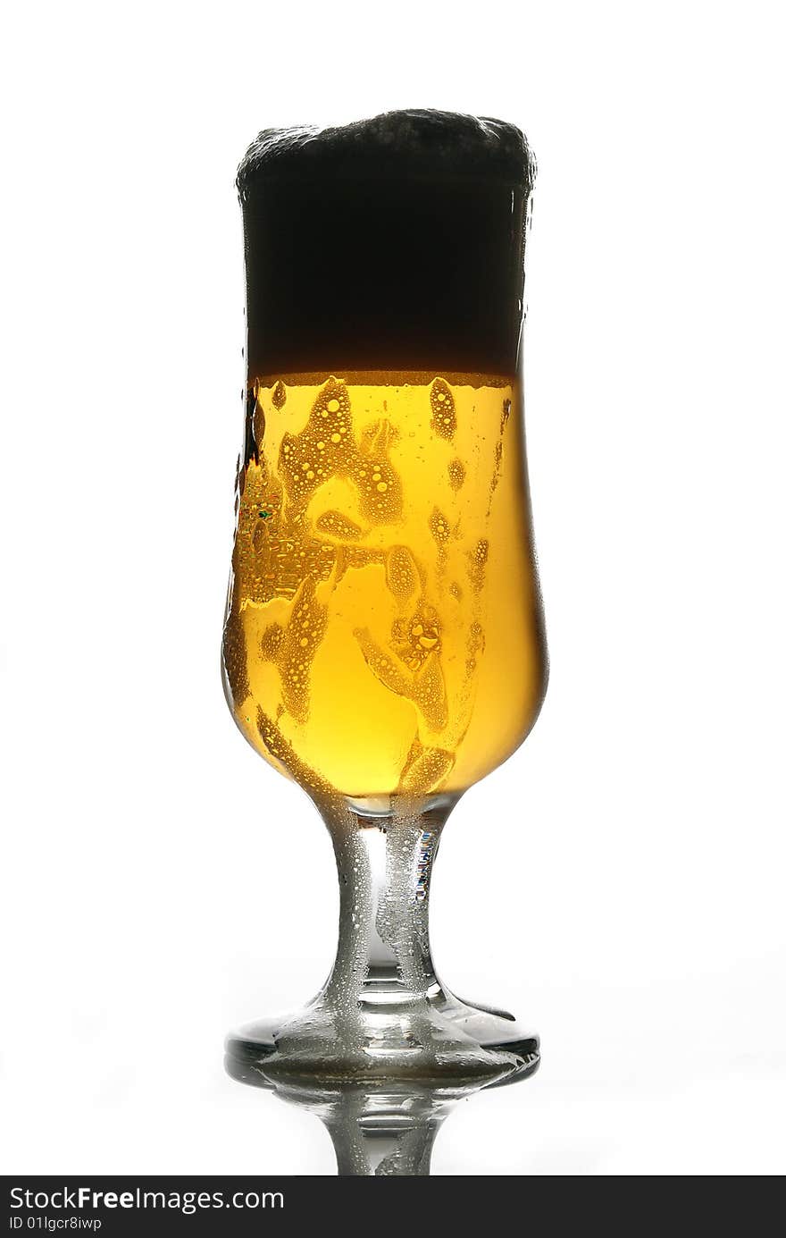 Glass of beer close-up shot