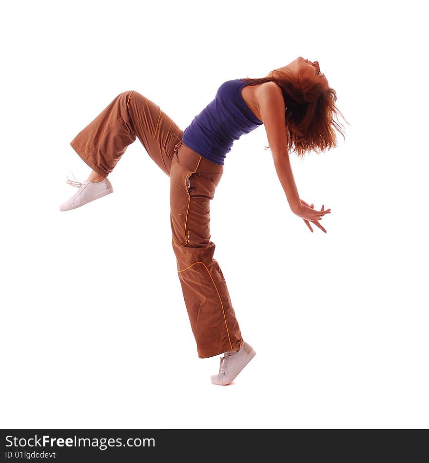 Young attractive teenage dancing over isolated white background