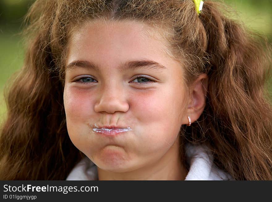 Funny girl brushing teeth