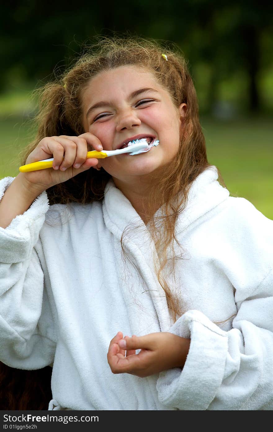 Funny Girl Brushing Teeth