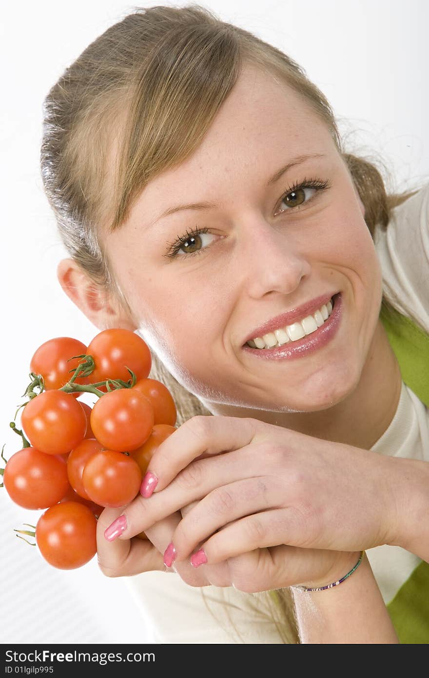 Beautiful young woman making vegetarian vegetable salad. Beautiful young woman making vegetarian vegetable salad