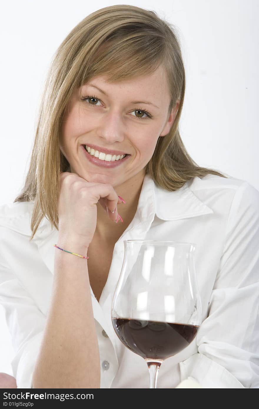 Women in kitchen with glass of wine. Women in kitchen with glass of wine