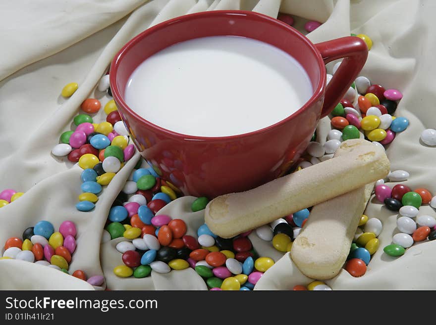 Cup milk and biscuits and sweets. Cup milk and biscuits and sweets