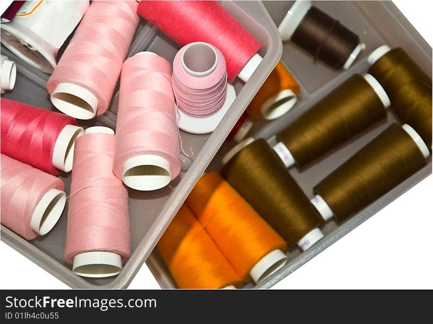 Drawers holding colorful embroidery threads used on materials of different types. Drawers holding colorful embroidery threads used on materials of different types.