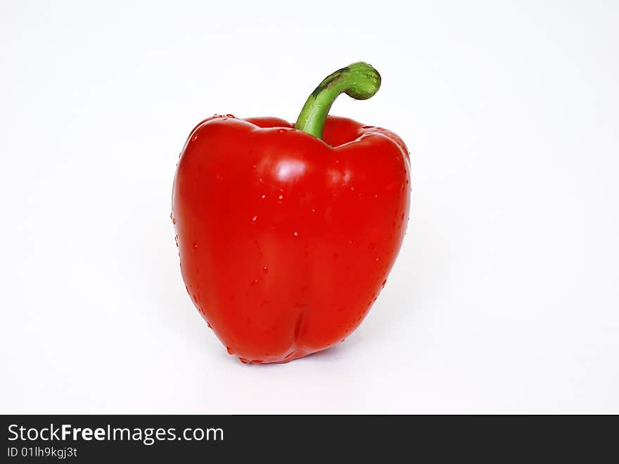 Red pepper on the white background