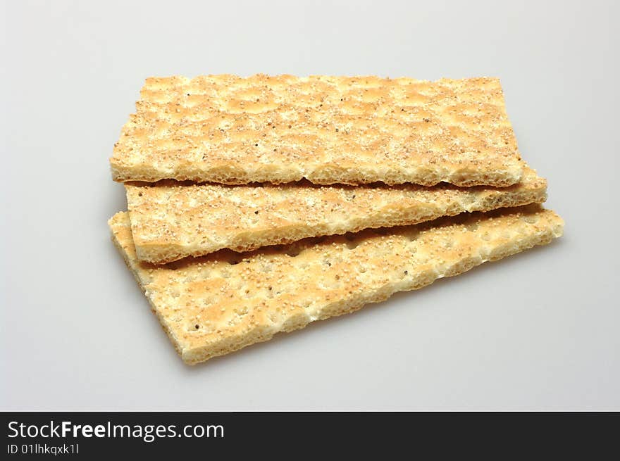 Three pieces of crispbread lying on top of each other.