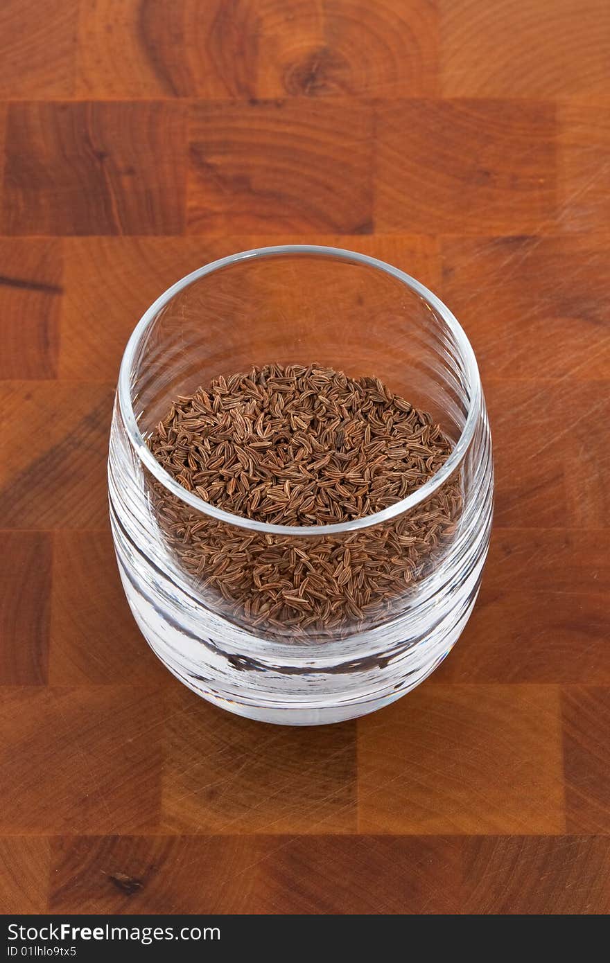 Seeds of dried caraway in glass