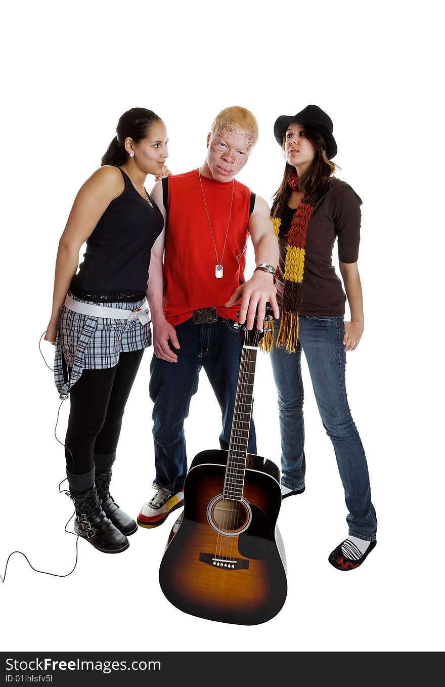 A mixed race musical group with a african albino male guitarist. A mixed race musical group with a african albino male guitarist