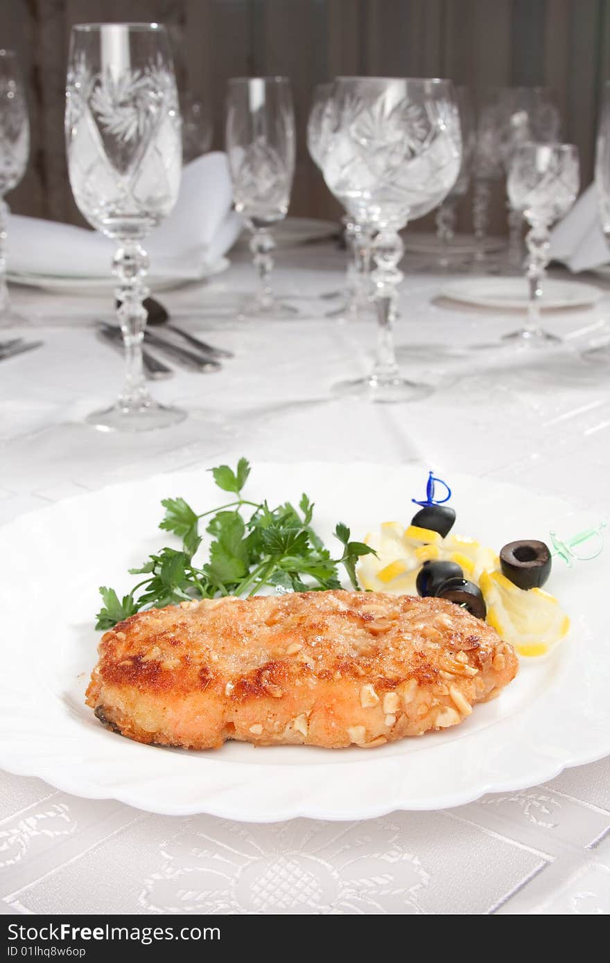 Chop served in white table with goblets