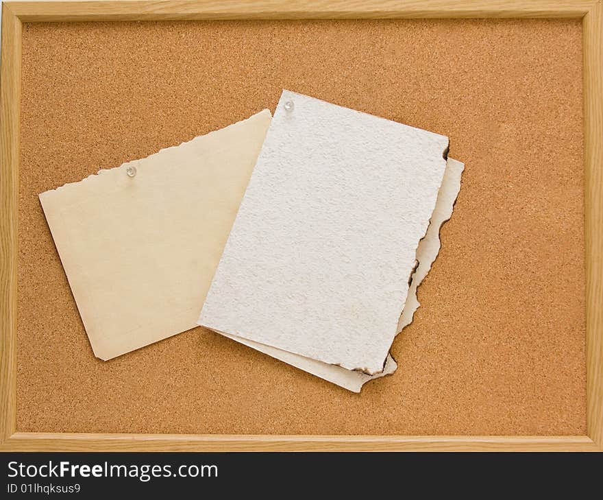 Brown corkboard with important message