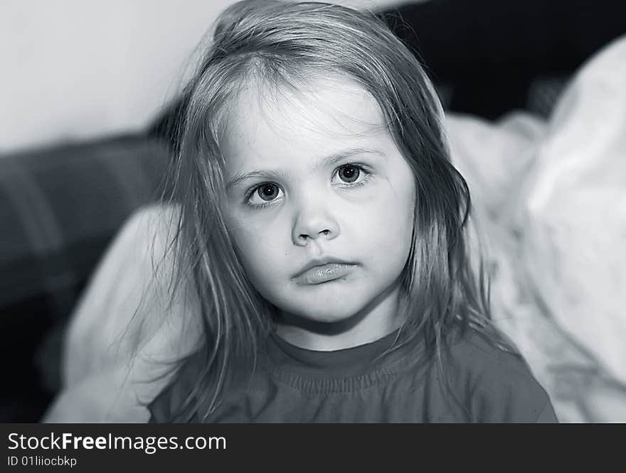 Portrait Of The Small Beautiful Girl