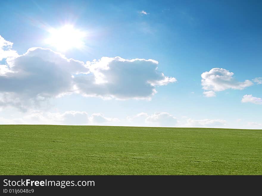 Bright rural scene of sun, grass and sky. Bright rural scene of sun, grass and sky