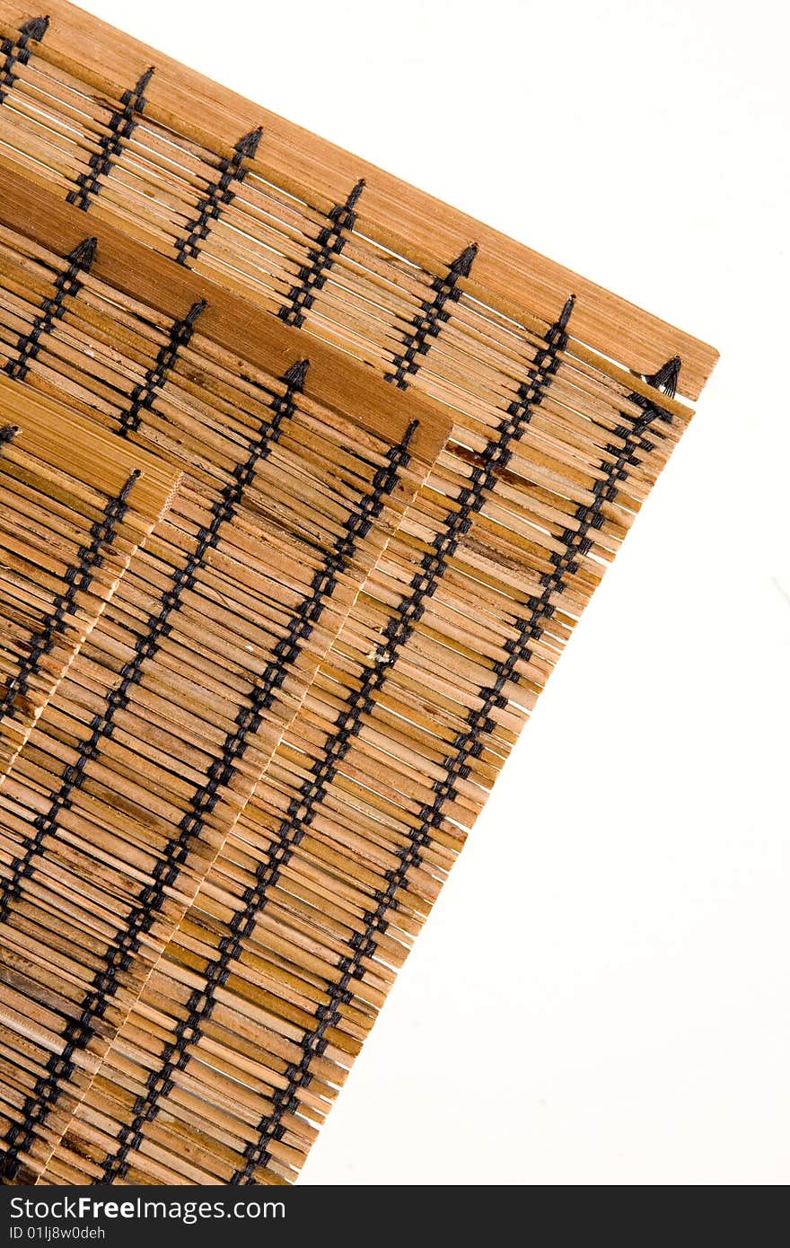 Three bamboo mats corners on white background vertical. Three bamboo mats corners on white background vertical