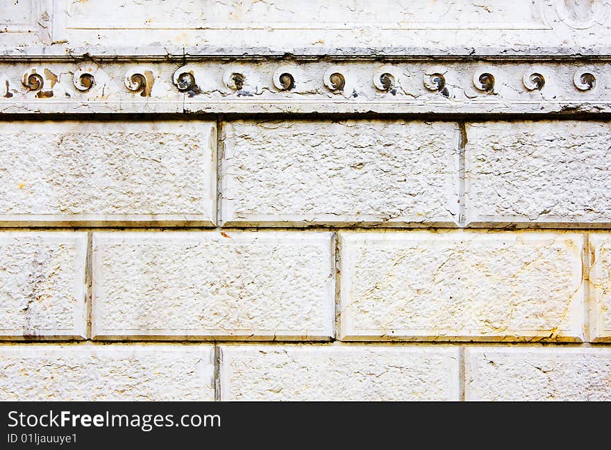 Old stone wall with small decorations