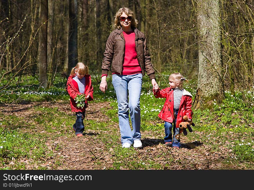 Mother with children in nature