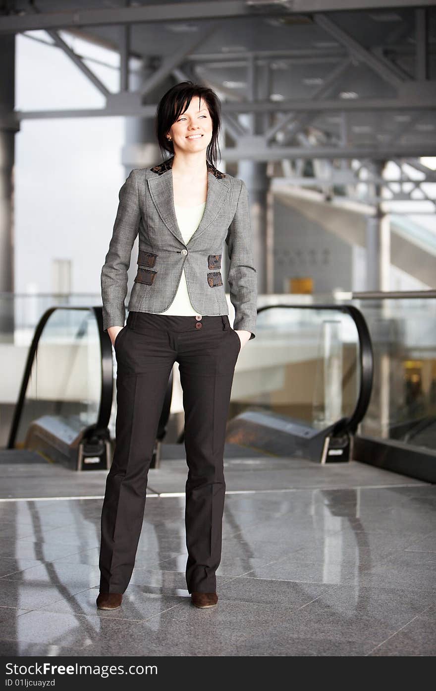 Young confident caucasian businesswoman in the working space. Young confident caucasian businesswoman in the working space