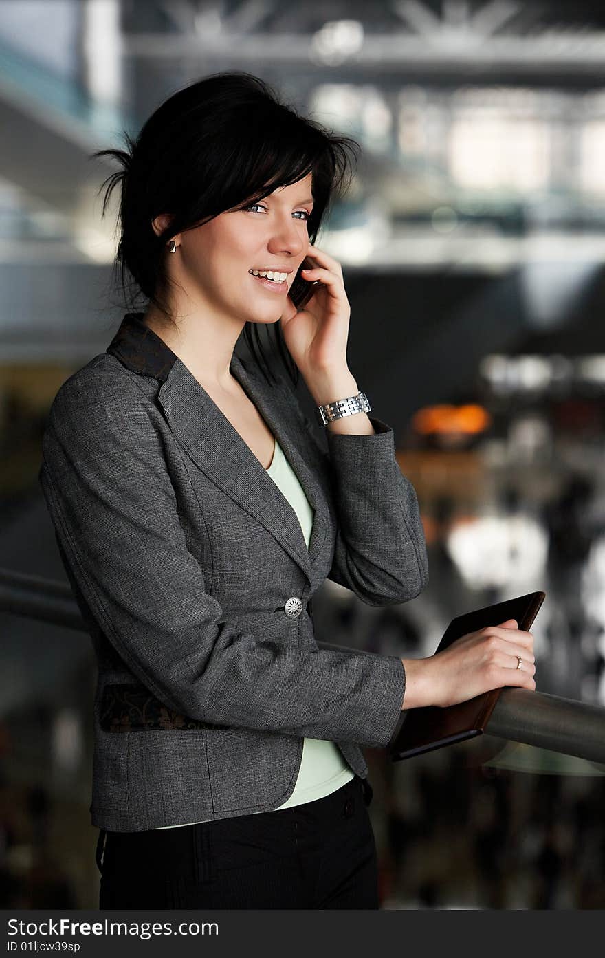 Young confident caucasian businesswoman in the working space. Young confident caucasian businesswoman in the working space