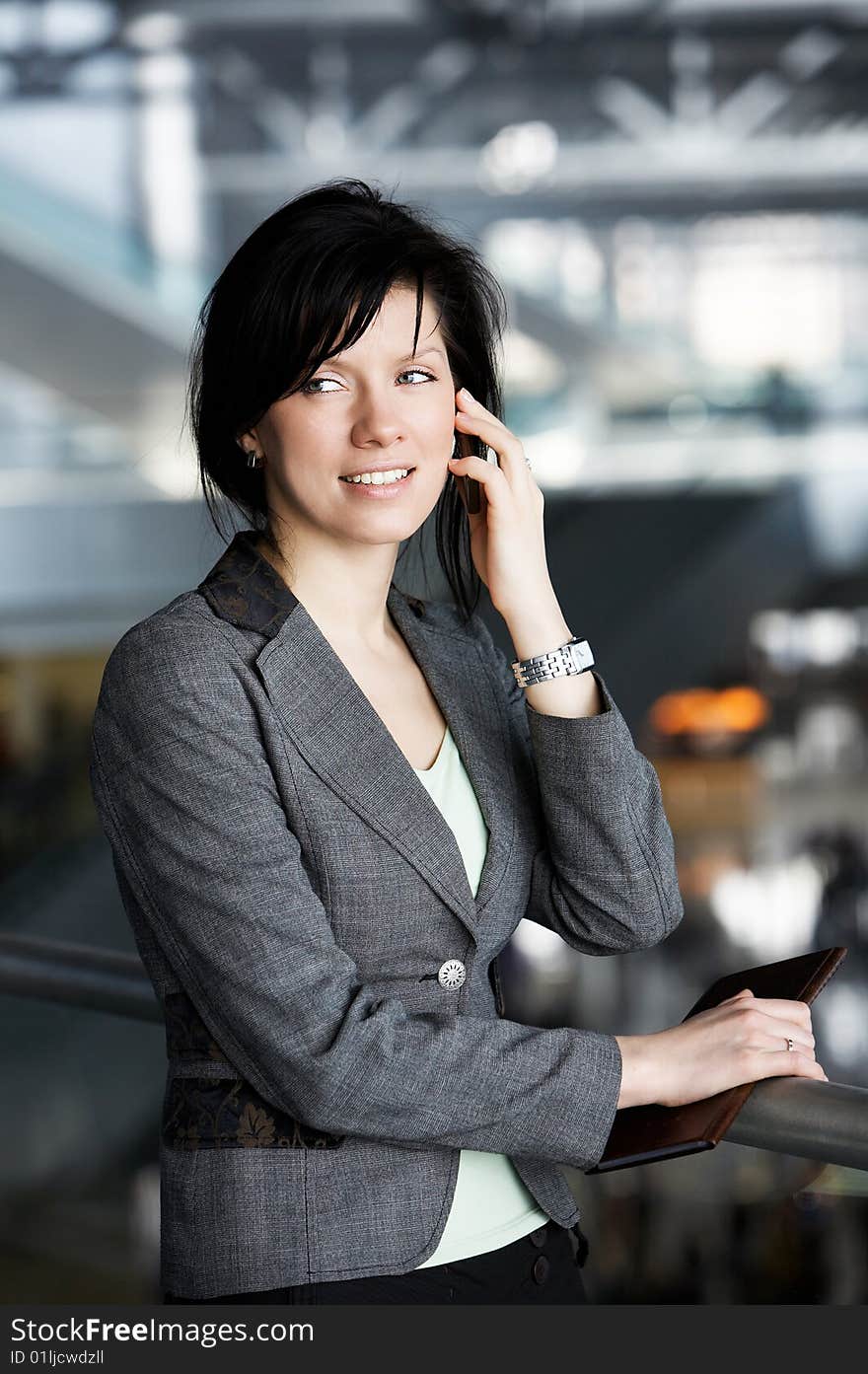 Young confident caucasian businesswoman in the working space. Young confident caucasian businesswoman in the working space