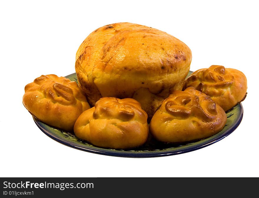 Bread and rolls on a dish. Bread and rolls on a dish